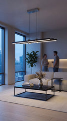 Şehir manzaralı lüks bir oturma odasında odak noktası olan Cosmo Up & Down modern siyah LED sarkıt avize kullanımı.
