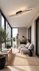 Modern bir kış bahçesi veya cam balkon alanında tavana monte edilmiş şık Cosmo lineer LED aydınlatma
