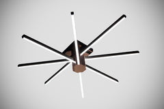 Modern Geometrik LED Avize – Siyah Lineer Kollar ve Bronz Merkezli Mimari Tavan Aydınlatması