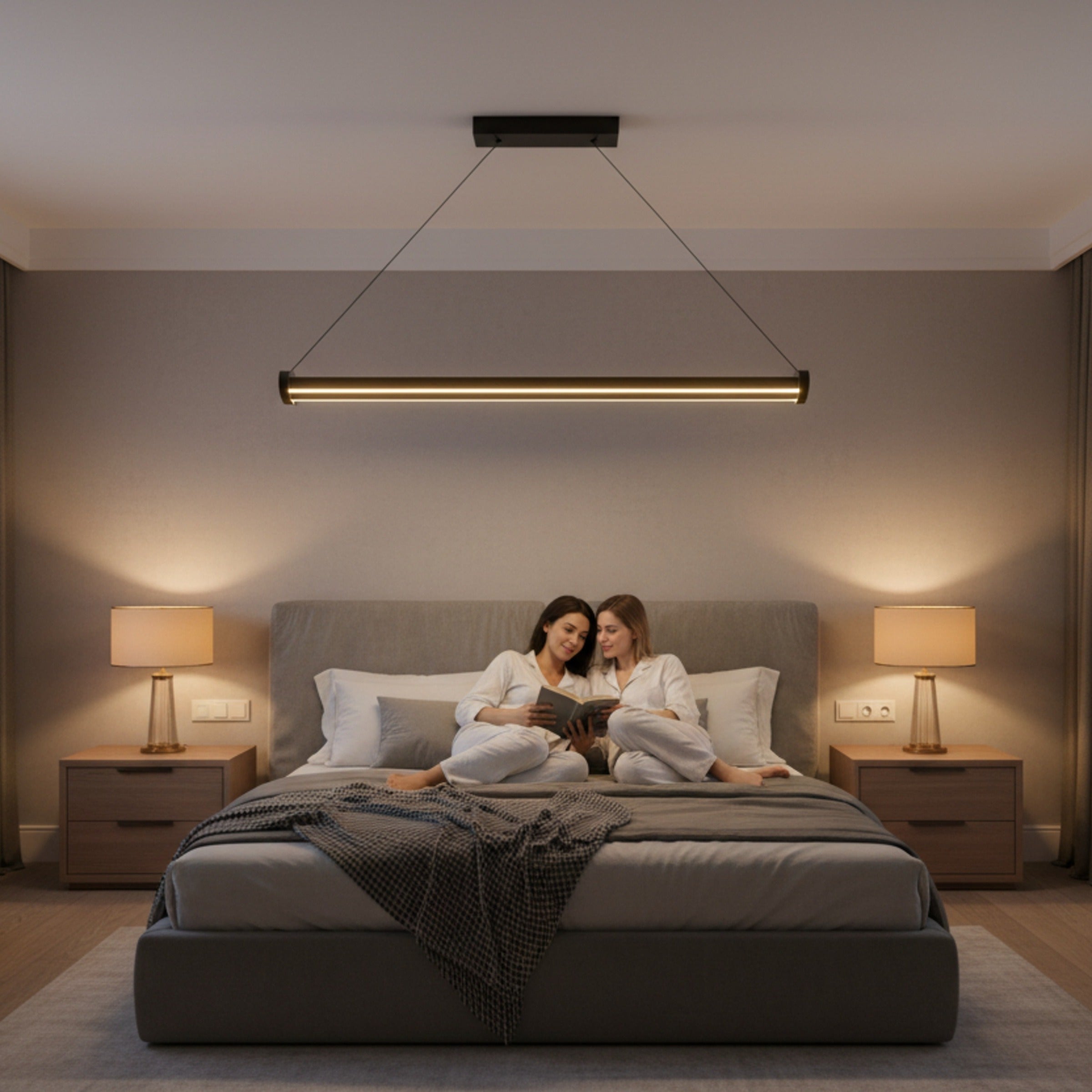 Yatak odasında yatak başı üzerinde konumlandırılmış mira modern lineer led sarkıt avize ile huzurlu kitap okuma ortamı.