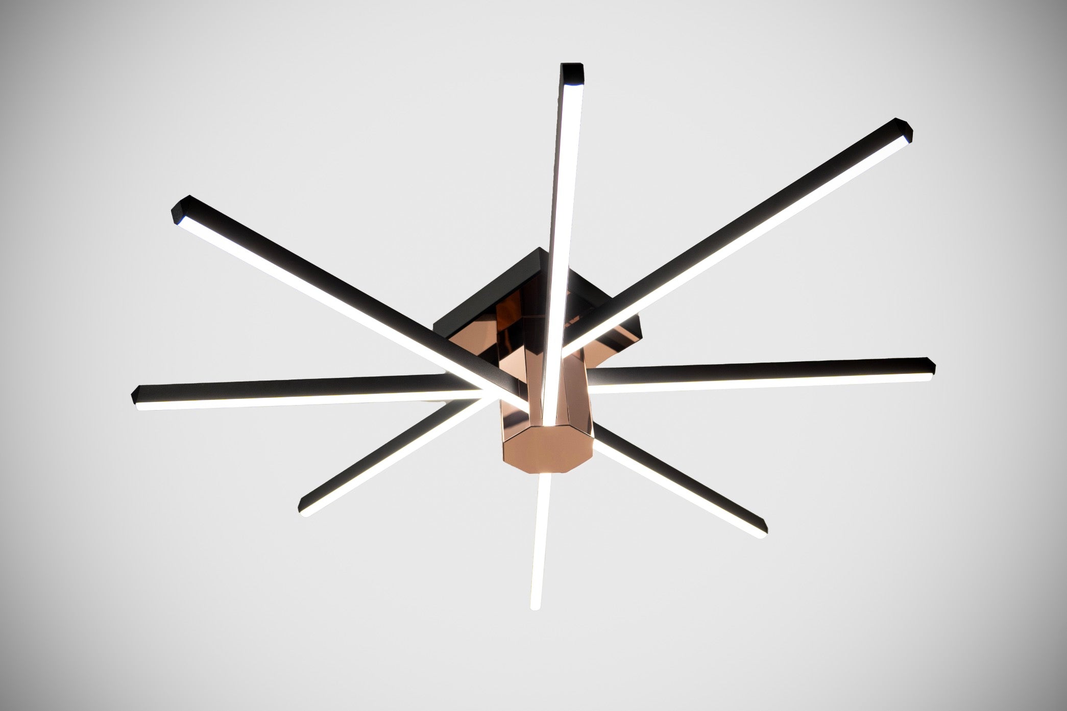 Sekiz kollu geometrik tasarımıyla modern iç mekanlara derinlik katan siyah ve bronz detaylı led tavan lambası.