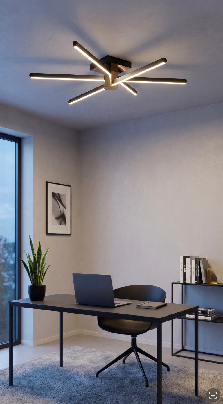 Modern ev ofisi dekorasyonunda çalışma masası üzerinde konumlanan Nova Six siyah led avize.