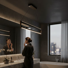 Banyo aynası önünde hazırlanan kadın için ideal makyaj ışığı sunan Orion modern lineer sarkıt avize.
