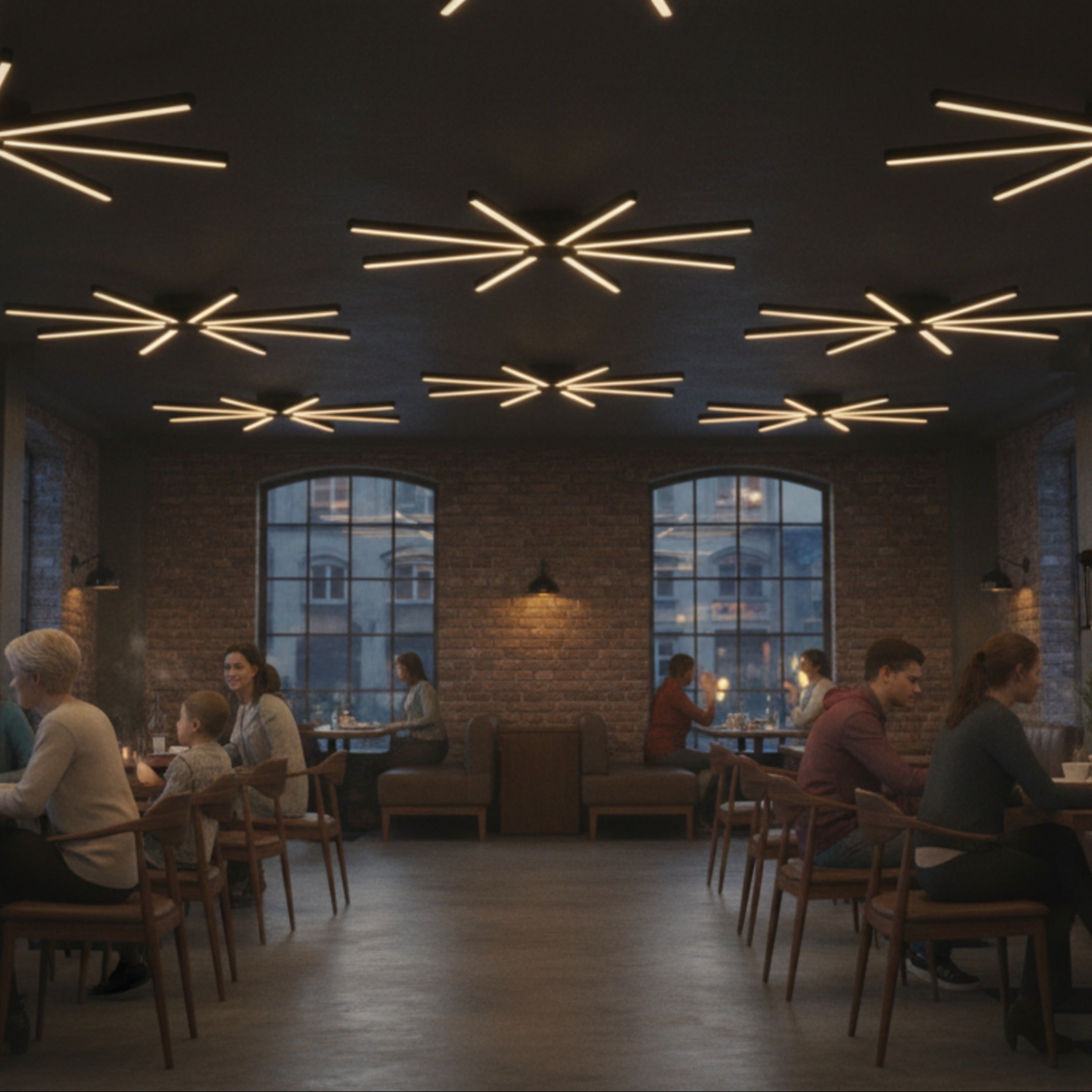 Endüstriyel modern iç mekan restoranında sıcak bir dokunuş sunan Pulsar tavan avizesi.