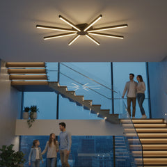 Modern bir villanın merdiven boşluğu ve giriş holünde Pulsar LED avize ile lüks karşılama.